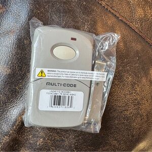 New! LINEAR Multi-​Code 1-​Button Visor Remote Transmitter 300MHz Gate & Garage